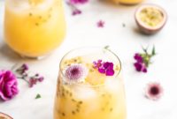 THOUGHTS: The user wants me to translate and “originalize” the given Turkish title into a single English title.
The Turkish title is not provided in the prompt, only the English title “Passion Fruit and Gin Fizz Cocktail”.
This implies the user wants me to *rephrase/originalize* the provided English title “Passion Fruit and Gin Fizz Cocktail”.

Constraints:
1.  Translate and originalize (but the source is already English, so it’s just originalizing/rephrasing).
2.  Provide only 1 original title.
3.  Remove special characters from the original title (the source already has none, and I shouldn’t add any).
4.  Do not use introductory phrases like “İşte özgün başlık:” or “Here’s the original title:”.
5.  Just write the title.

The current title “Passion Fruit and Gin Fizz Cocktail” is quite descriptive and good. “Originalizing” could mean making it more catchy, evocative, or concise, while still retaining the core information (passion fruit, gin, fizz, cocktail).

Ideas for rephrasing:
*   Focus on the taste/experience: “Tropical Gin Fizz,” “Zesty Passion Gin Sparkler”
*   More elegant/sophisticated: “Passion Gin Fizz Elixir,” “The Passionfruit Gin Fizz”
*   Slightly more descriptive but still concise: “Sparkling Passion Fruit Gin Fizz”

Let’s go for something that hints at the experience and includes the key ingredients, but perhaps with a slightly different flow.
“Passion Fruit and Gin Fizz Cocktail” -> “Passion Fruit Gin Fizz” (simplifies “Cocktail” as “Fizz” already implies a drink)
“Passion Fruit and Gin Fizz Cocktail” -> “Sparkling Passion Gin Fizz” (adds an adjective)
“Passion Fruit and Gin Fizz Cocktail” -> “Tropical Passion Gin Fizz” (adds a flavor profile adjective)

I should choose one that is still clear and appealing. “Sparkling Passion Gin Fizz” sounds good and highlights a key characteristic of a fizz.
“Passion Fruit Gin Fizz” is also very direct and clean.

Let’s stick close to the original meaning but make it slightly more dynamic.
“Passion Fruit and Gin Fizz Cocktail”
Could be:
1.  Passion Gin Fizz
2.  Sparkling Passionfruit Gin
3.  Tropical Gin Fizz with Passion

The user asked to “özgünleştir” which means to make it unique/original.
“Passion Fruit Gin Fizz” is a good, concise version. It removes the redundant “cocktail” and the “and”.
It’s still very clear.

Let’s try to add a bit of flair without overdoing it.
“Passion Fruit Gin Fizz Elixir” (might be too much)
“The Passionfruit Gin Sparkler” (good, but changes “Fizz”)
“Golden Passion Gin Fizz” (adds color, might not always be golden)

I will go with a slightly more concise and punchy version that still clearly indicates the ingredients and type of drink.
“Passion Fruit Gin Fizz” is a solid, straightforward, and slightly more modern take.
Or “Sparkling Passion Fruit Gin Fizz” if I want to emphasize the fizz aspect more.

Considering “özgünleştir” (make unique/original), just removing “and Cocktail” might not be “original” enough for the user.
How about a title that evokes the sensation?
“Zesty Passion Gin Fizz” – highlights a characteristic.
“Tropical Passion Gin Fizz” – highlights the flavor profile.

I need to choose just one. Let’s aim for something that is descriptive but also has a nice flow.
“Passion Fruit and Gin Fizz Cocktail”
Originalized: “Sparkling Passion Gin Fizz”
This highlights the fizz and keeps the core ingredients. No special characters, no introductory phrases.