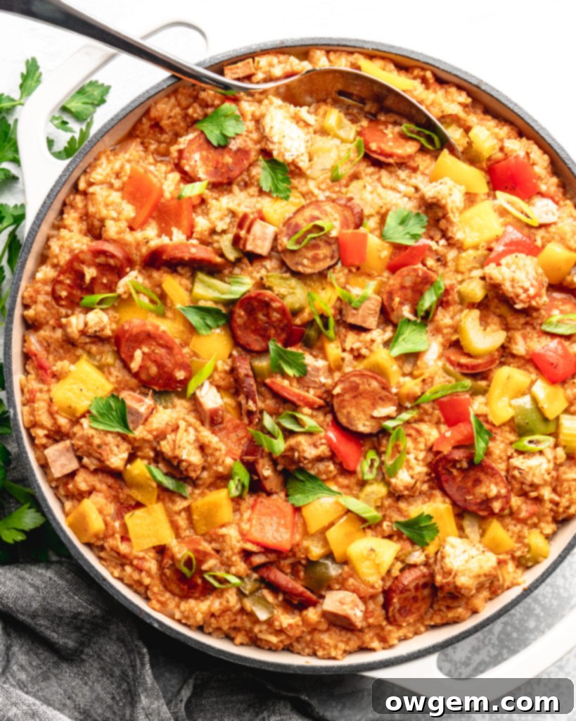 Easy Crockpot Jambalaya brimming with chicken, chorizo, smoked ham, and garlic sausage