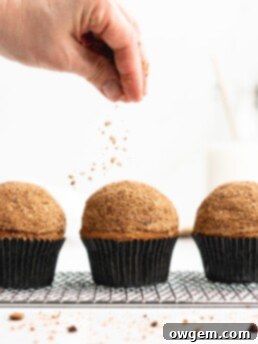 Spongy sweet chocolate chip cupcakes are topped with a creamy brown sugar frosting,and then rolled in crumbled chocolate chip cookies