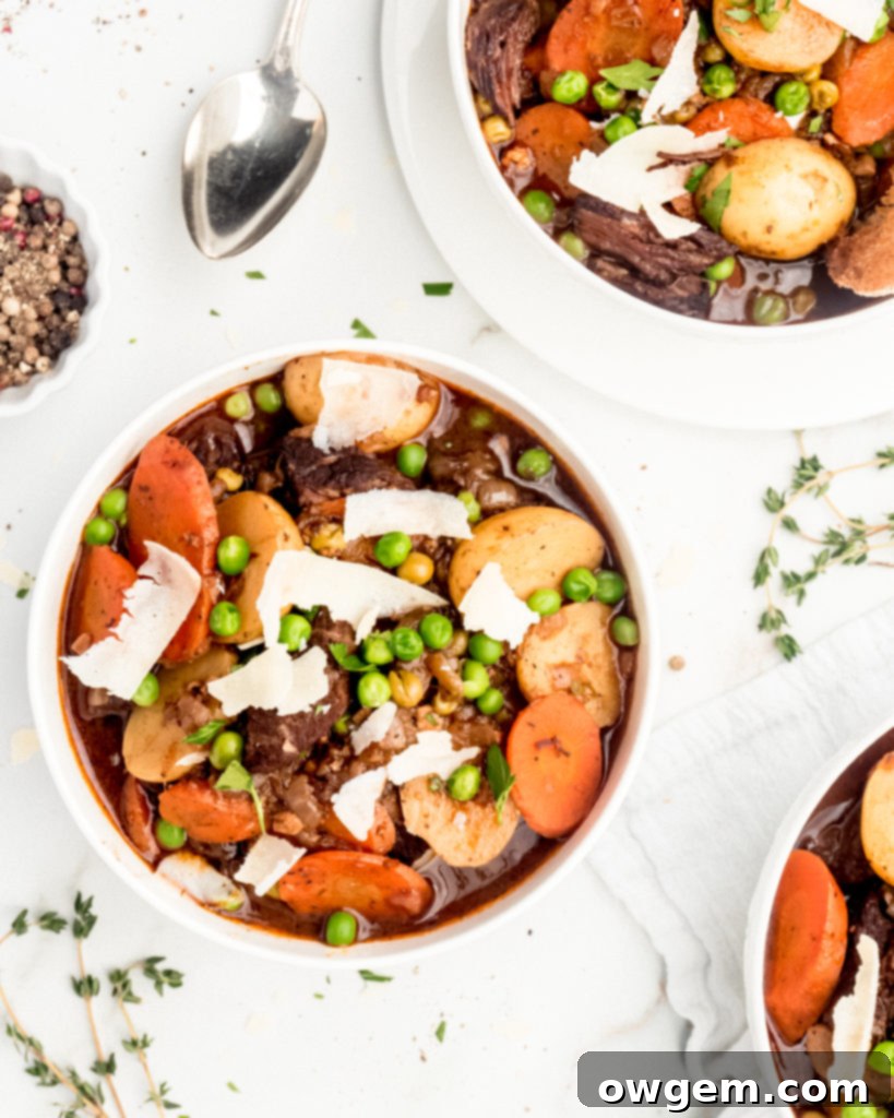 Melt in your mouth pieces of chuck steak, vibrant thick cut carrots, buttery baby potatoes, and brightly flavored peas are braised in a red wine liquid to create a delicious and hearty beef stew