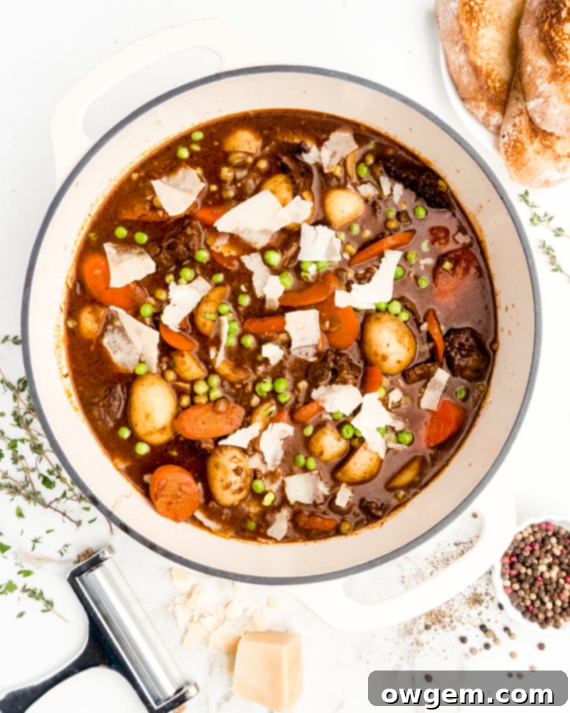 Melt in your mouth pieces of chuck steak, vibrant thick cut carrots, buttery baby potatoes, and brightly flavored peas are braised in a red wine liquid to create a delicious and hearty beef stew