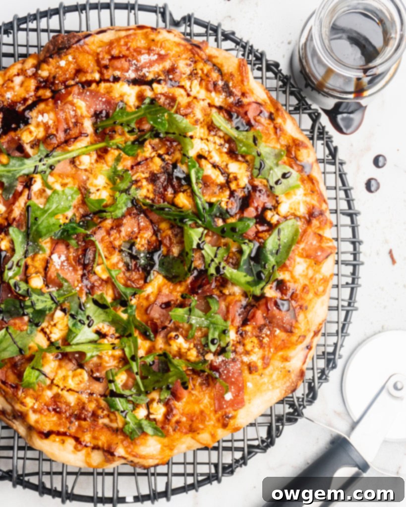 Prosciutto, goat cheese, and balsamic reduction are added to your typical pizza, and then baked in a cast iron pan to create a pizzeria style pizza at home!