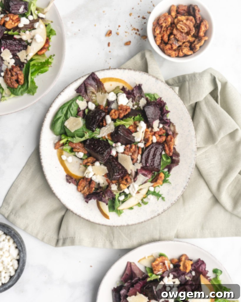 This delicious salad is made up on maple and brown sugar glazed beets, sliced crisp bosc pears, creamy tart goat cheese, shaved parmesan, and candied walnuts.