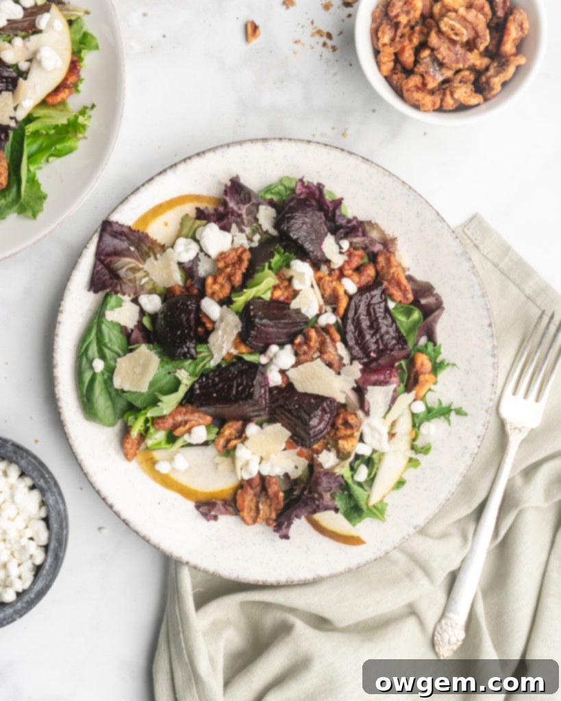 This delicious salad is made up on maple and brown sugar glazed beets, sliced crisp bosc pears, creamy tart goat cheese, shaved parmesan, and candied walnuts.