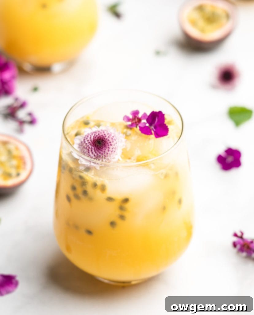 This gorgeous cocktail just screams summer, with the tropical passion fruit, bubbly club soda, and flavorful gin.