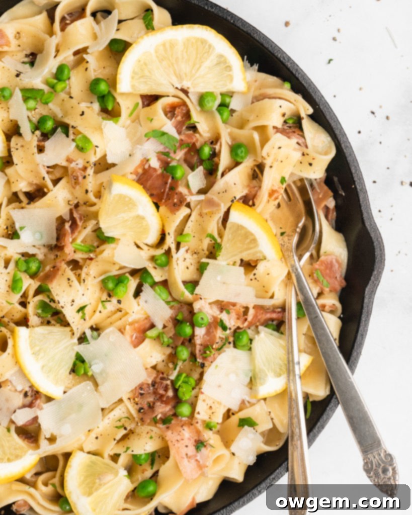 Close-up of golden fried prosciutto and finely chopped shallots sizzling in a pan, ready for the creamy sauce.
