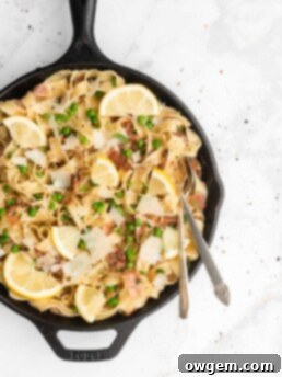 Lemon Prosciutto and Pea Fettuccine, a creamy and zesty pasta dish with golden prosciutto and green peas.