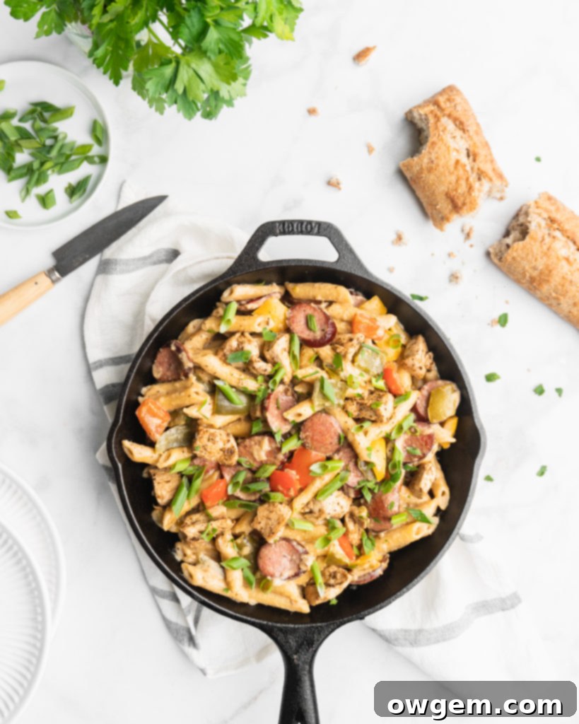 Penne, cream, peppers, onions, cajun chicken, and garlic sausage make up this easy and delicious one pot recipe.  