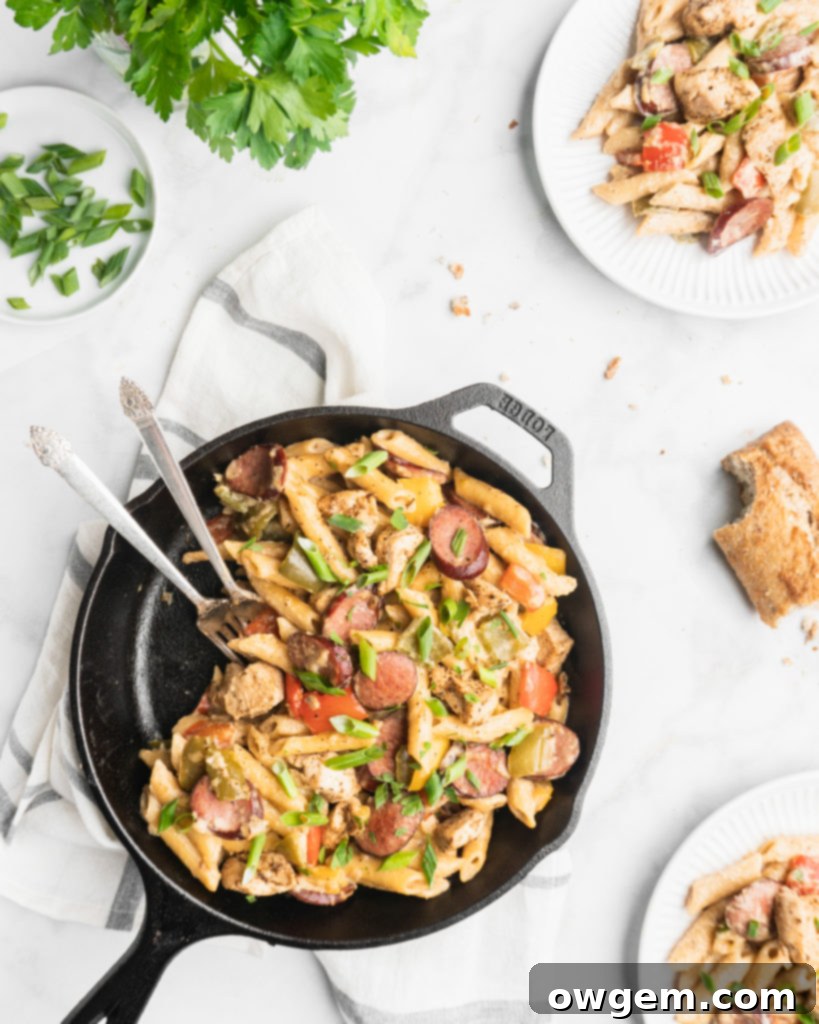 Penne, cream, peppers, onions, cajun chicken, and garlic sausage make up this easy and delicious one pot recipe.