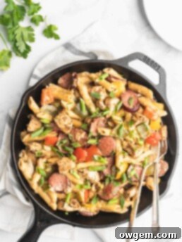 Penne, cream, peppers, onions, cajun chicken, and garlic sausage make up this easy and delicious one pot recipe.