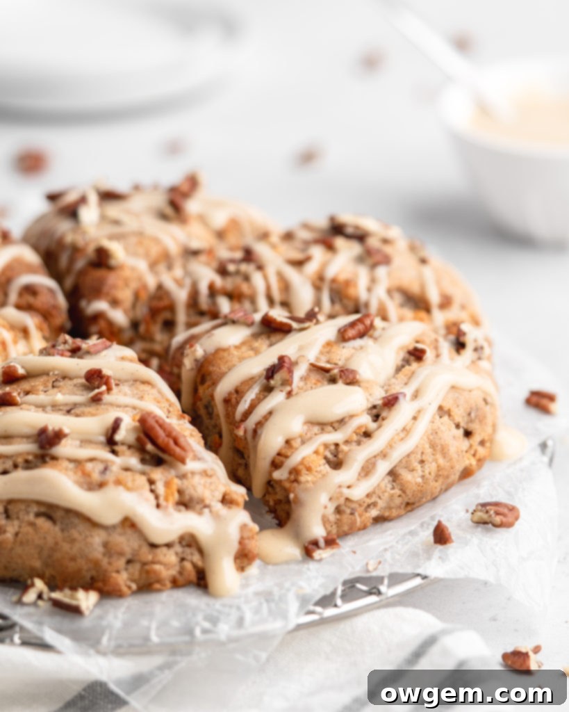 These carrot cake cones are sweet, heart warming, and delicious! With pecans and maple cream cheese glaze