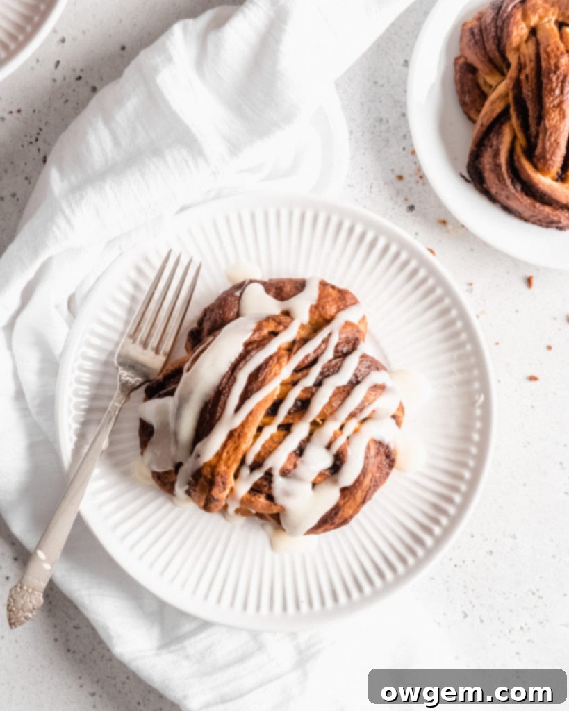 Beautiful cinnamon buns that are knotted into babka knots