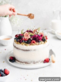 This Pistachio cake is styled in a semi-naked fashion with honey rosewater swiss meringue buttercream
