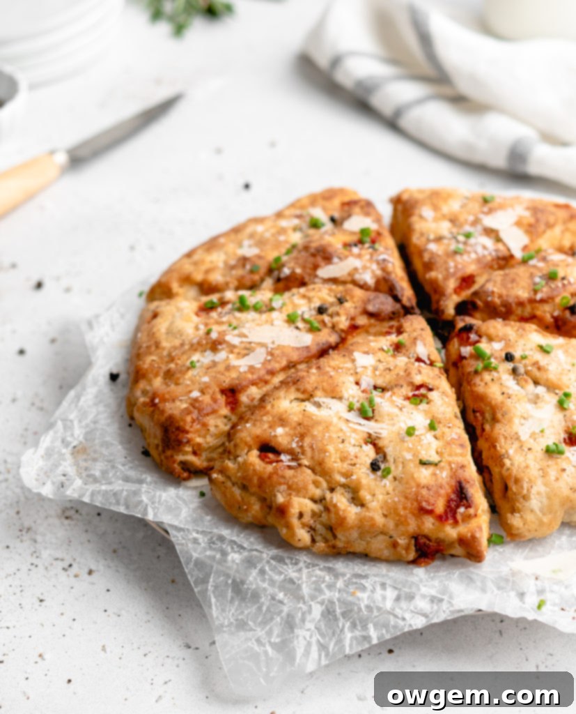 Flaky, tender scones that feature balsamic roasted red peppers, goat cheese, fresh rosemary, and parmesan cheese