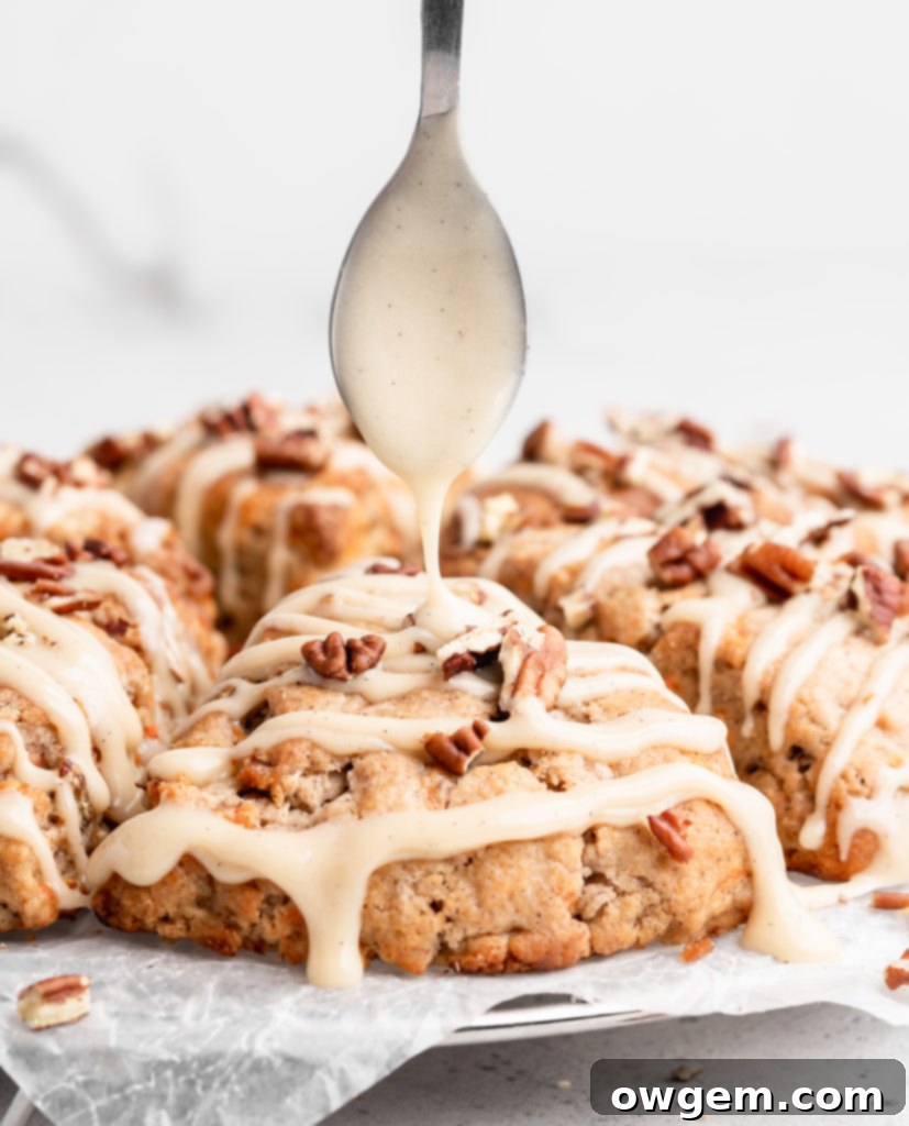These carrot cake cones are sweet, heart warming, and delicious! With pecans and maple cream cheese glaze
