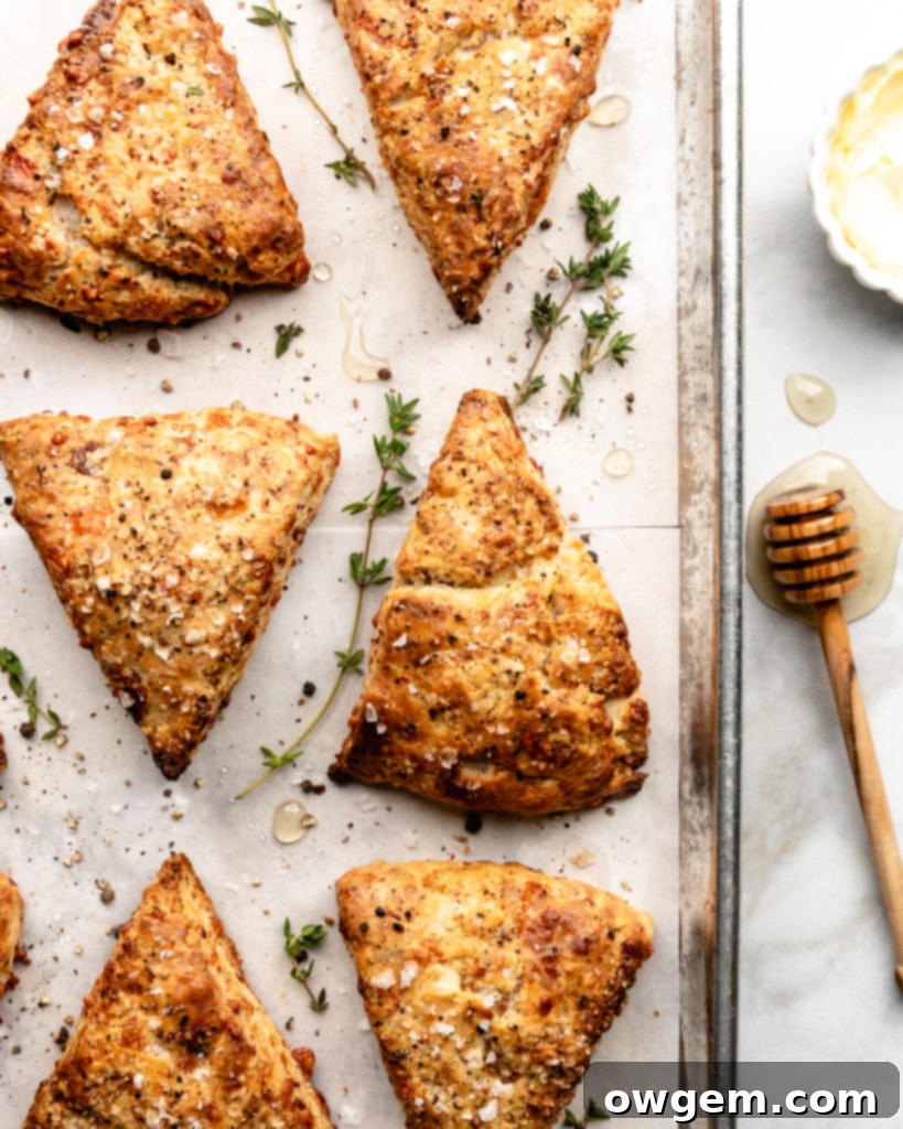 Savory bacon gruyere breakfast scones are flaky, savory, and delicious. Serve with butter or a bit of honey.
