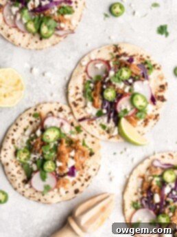 Pulled chipotle chicken is the main filling for these delicious tacos.