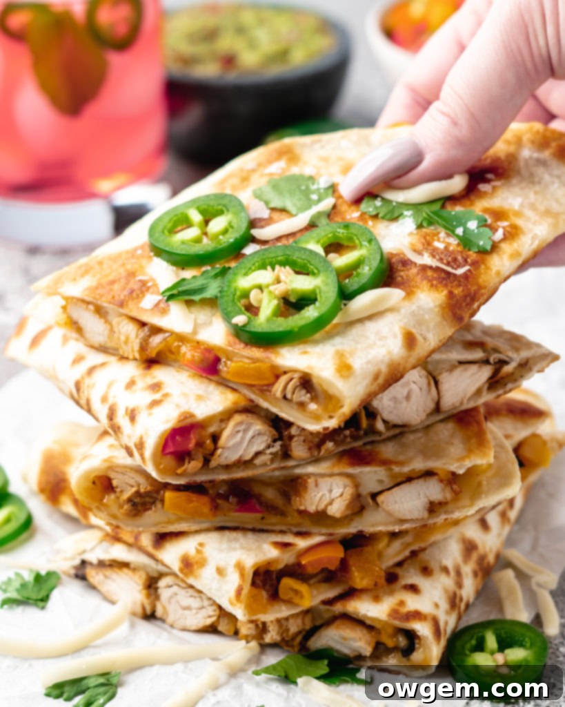 Crispy tropical chicken quesadillas with pineapple, lime, and cheese.