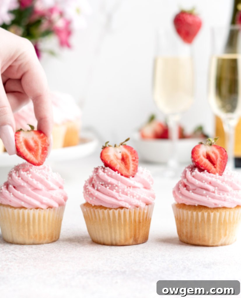 Bubbling with fun flavors, these Prosecco Cupcakes are topped with a fruity strawberry buttercream
