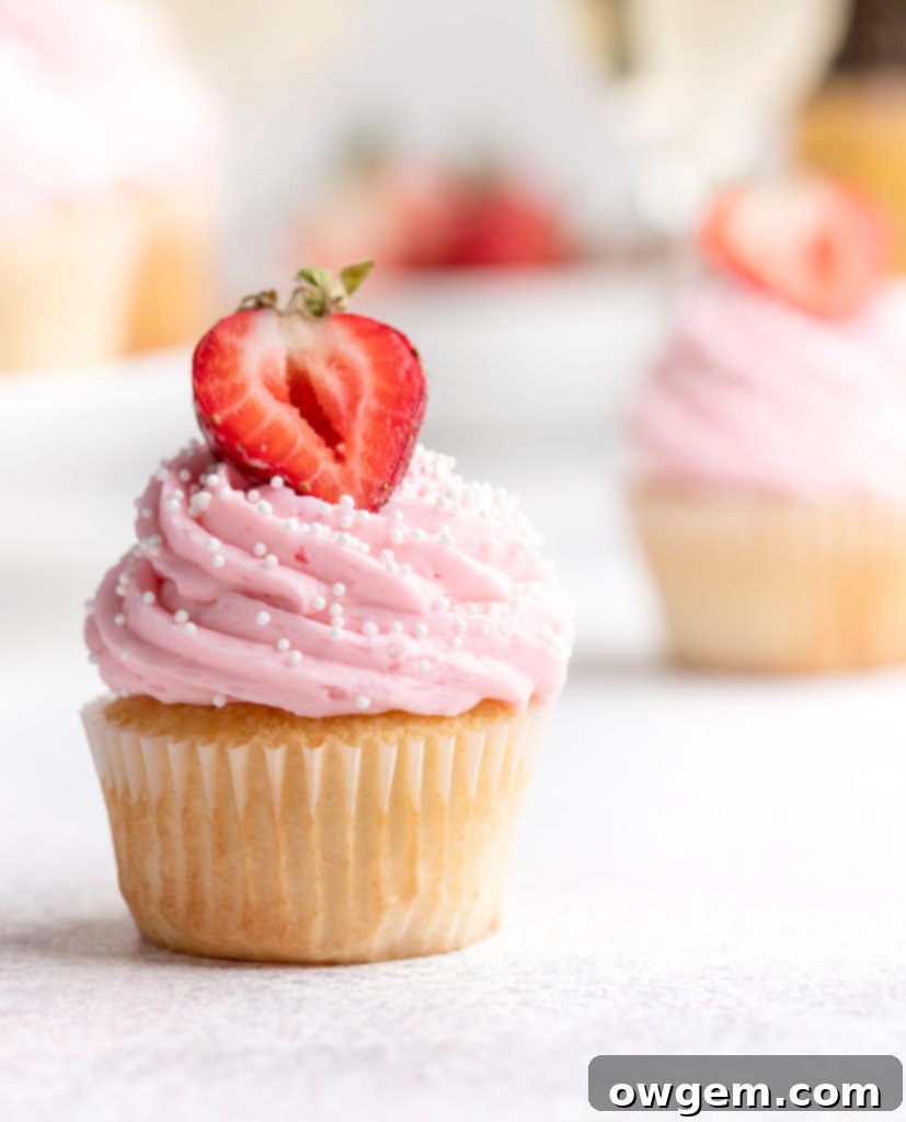 Bubbling with fun flavors, these Prosecco Cupcakes are topped with a fruity strawberry buttercream