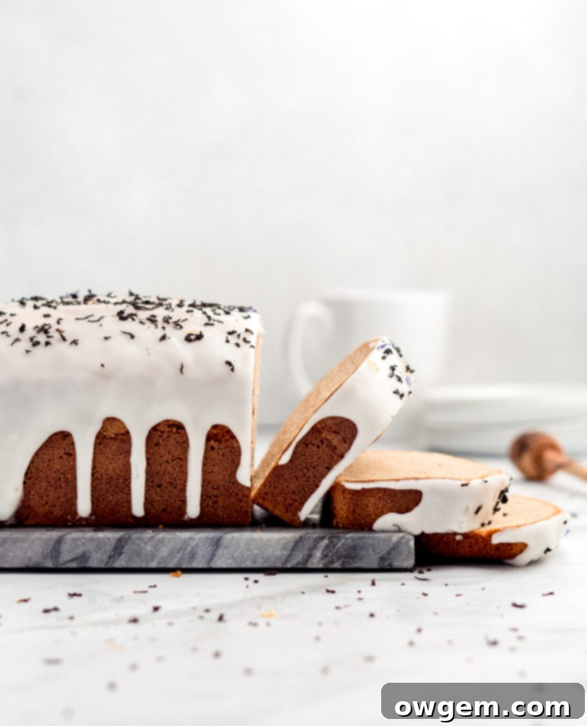 This loaf cake is flavored with Earl Grey tea and then glazed with a lemon honey glaze, offering a delightful and unique flavor profile.