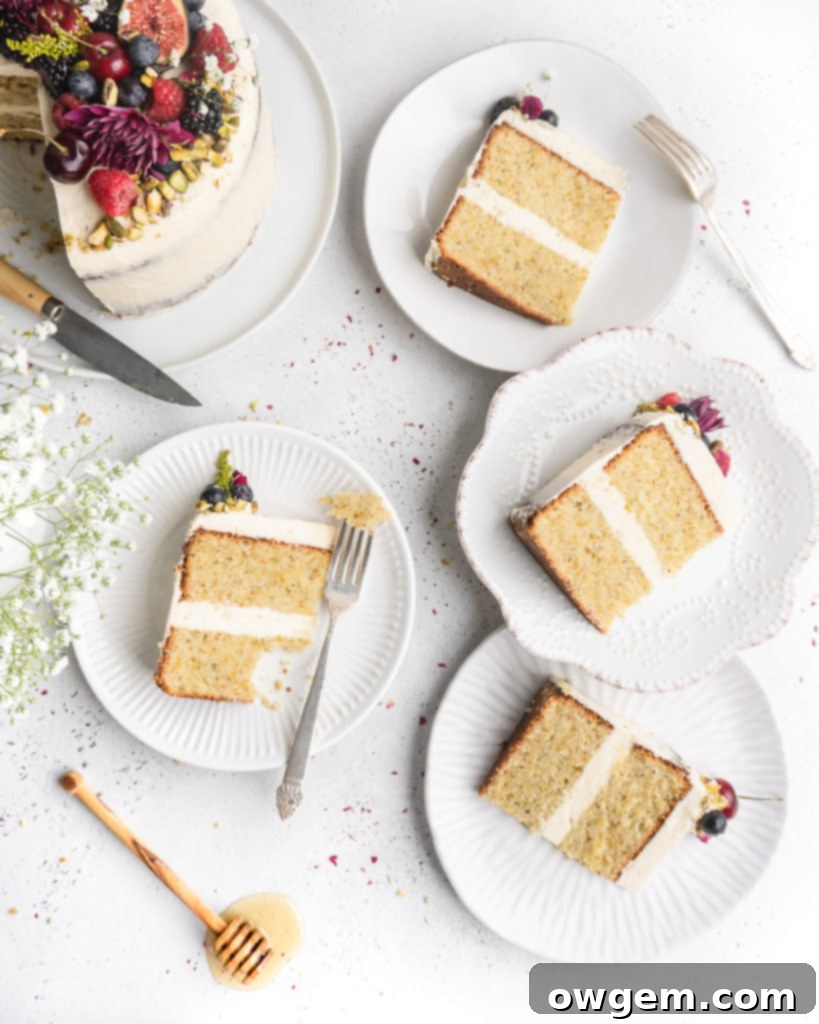 This Pistachio cake is styled in a semi-naked fashion with honey rosewater swiss meringue buttercream