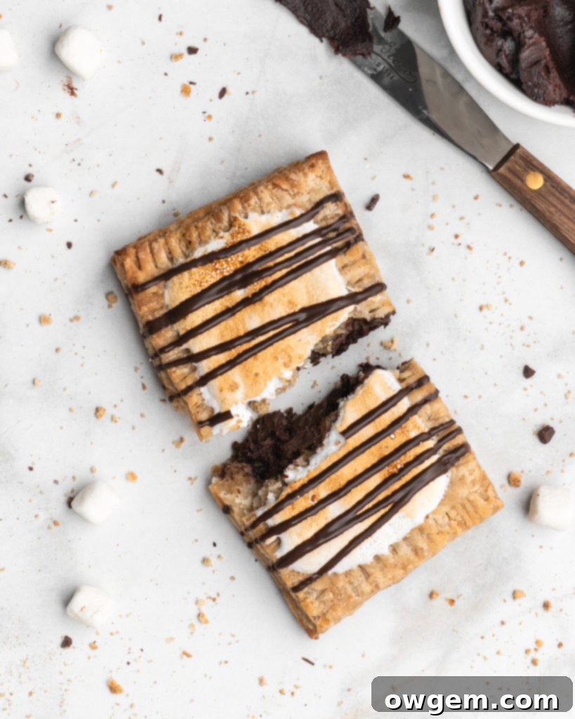 Every bite of these S'mores Hand Pies delivers the perfect blend of chocolate, graham cracker, and toasted marshmallow.
