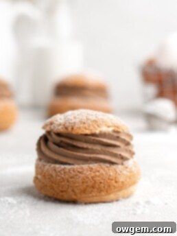 These cream puffs feature a crispy craquelin topping, and a creamy mocha pastry cream