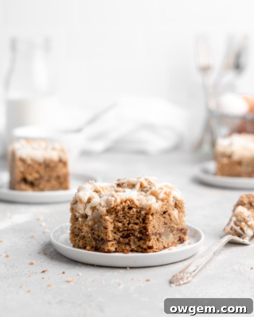 Fresh, crisp Pink Lady apples, ideal for baking in an apple cinnamon spice cake, highlighting their vibrant color and firm texture