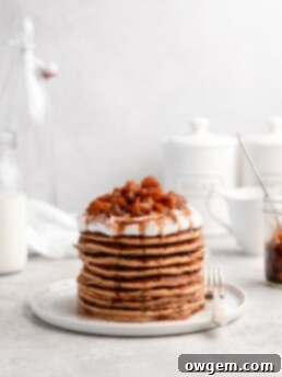 These fluffy apple cinnamon pancakes are topped with a delicious apple compote and apple syrup
