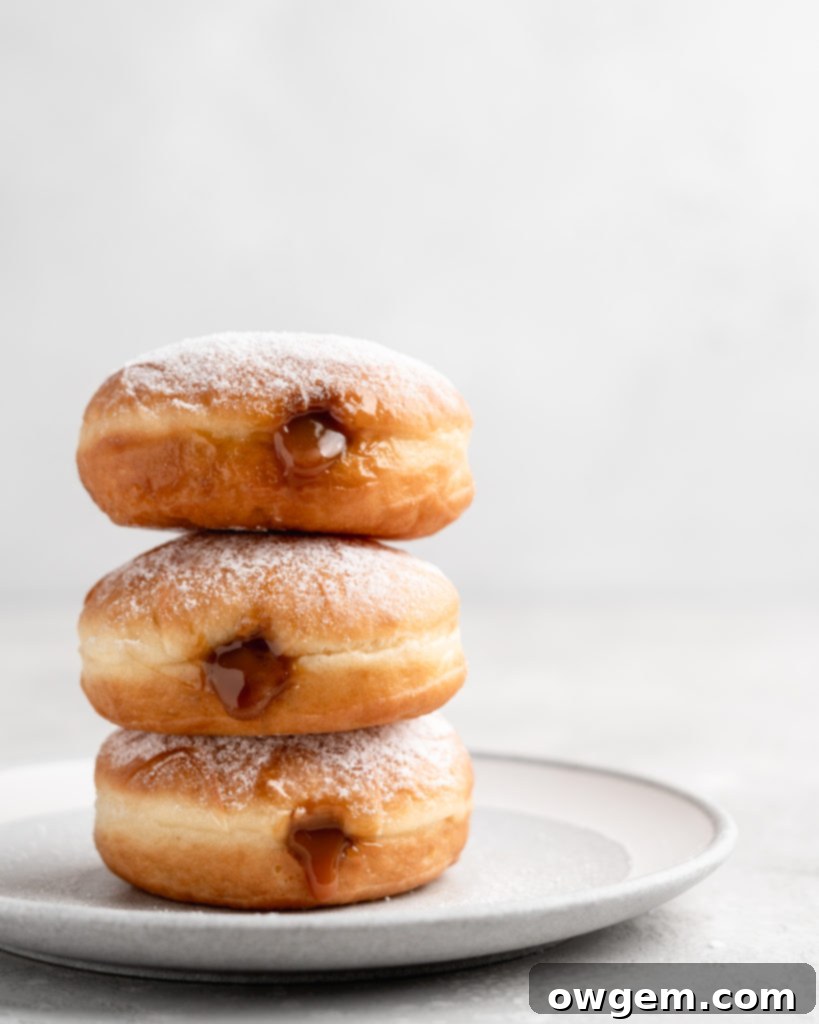 Filled with creamy, deeply sweet dulce de leche, these filled yeast donuts are crazy delicious