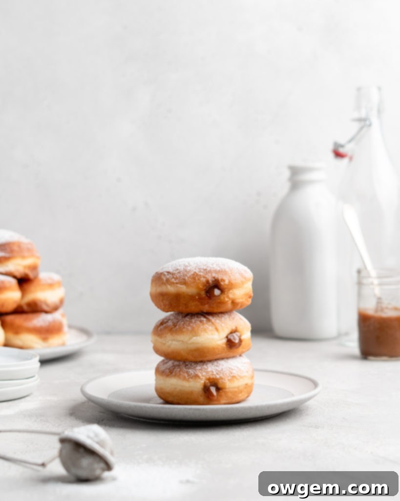 Filled with creamy, deeply sweet dulce de leche, these filled yeast donuts are crazy delicious