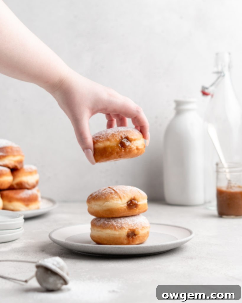 Filled with creamy, deeply sweet dulce de leche, these filled yeast donuts are crazy delicious
