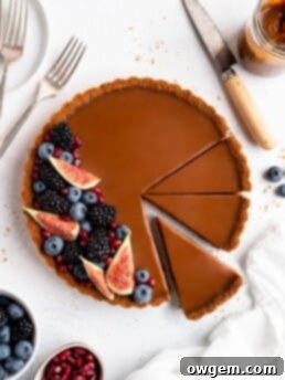 This Caramelized White Chocolate Tart features a silky, creamy caramelized white chocolate ganache filling inside a crunchy biscoff crust