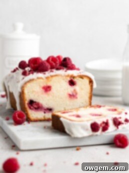 Loaf cake that is flavoured with rosewater and speckled with fresh raspberries. Glazed with a thick rosewater glaze