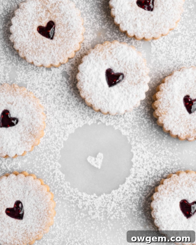 Linzer Cookies with heart-shaped cut-outs, ready for baking and filling