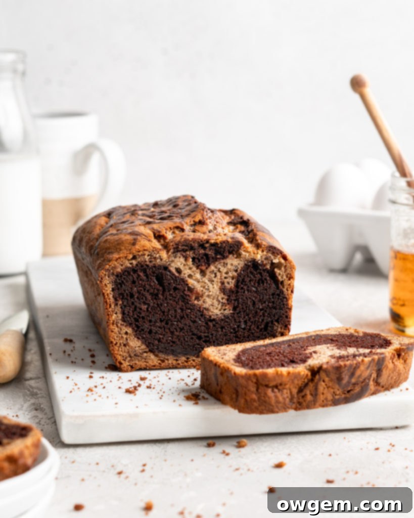 Half chocolate half traditional banana bread has a marble effect