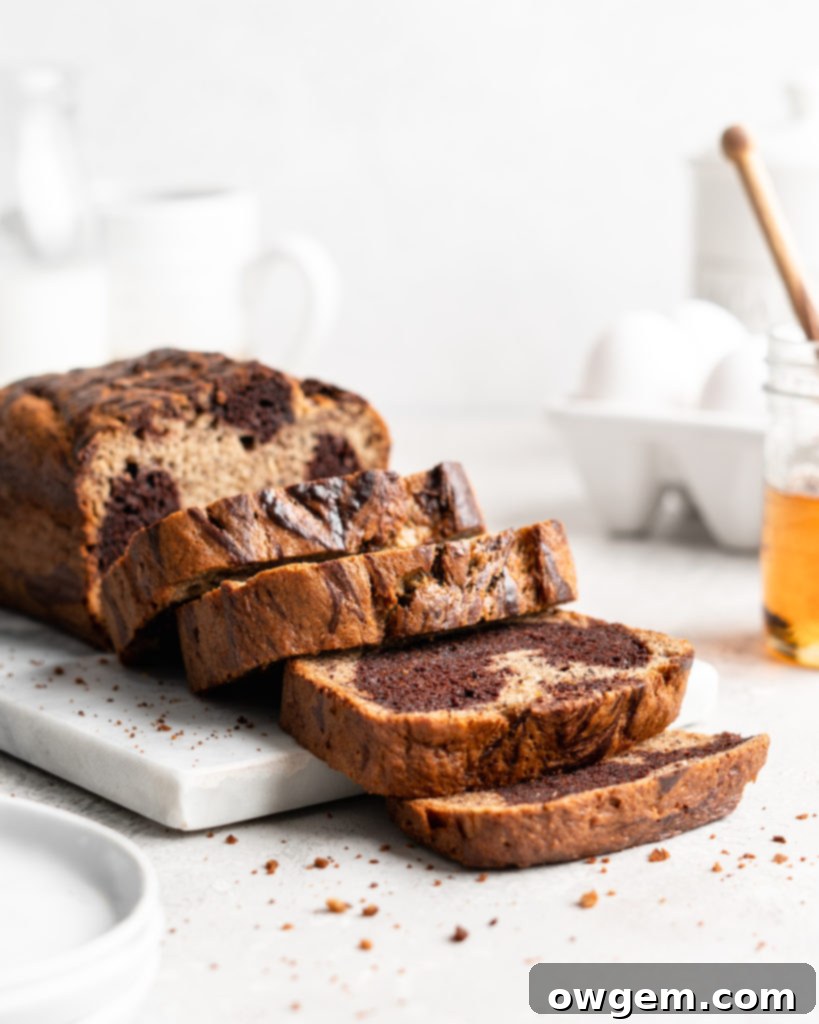 Half chocolate half traditional banana bread has a marble effect