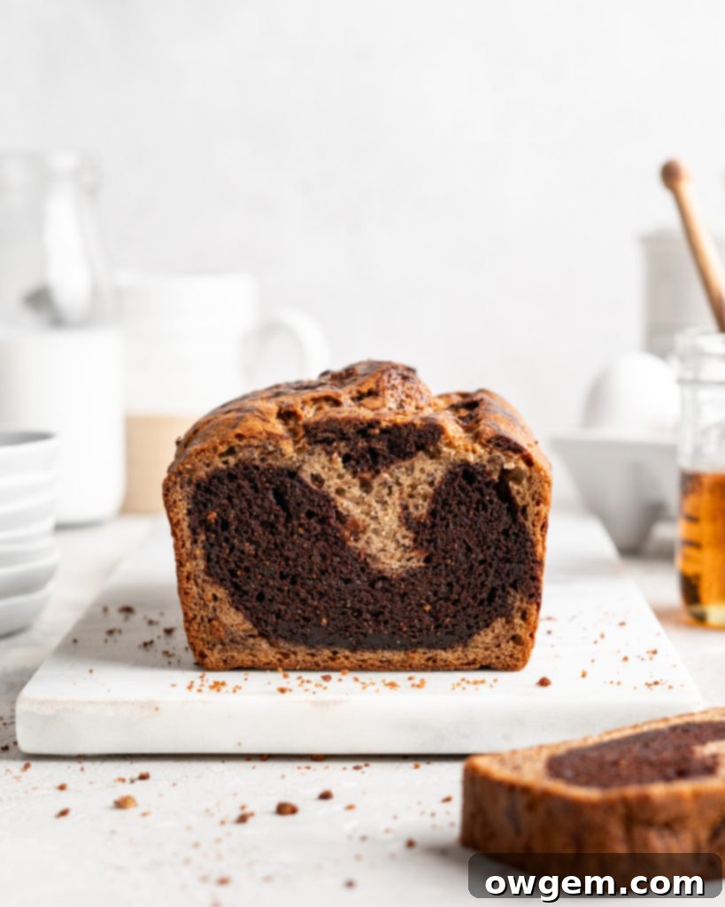 Half chocolate half traditional banana bread has a marble effect