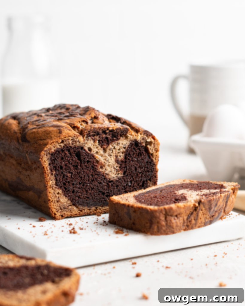 Half chocolate half traditional banana bread has a marble effect