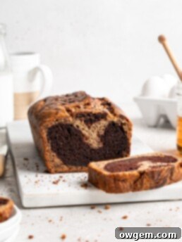 Half chocolate half traditional banana bread has a marble effect