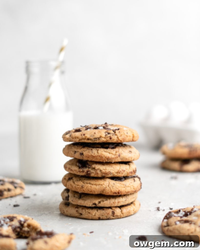 Measuring flour with a digital kitchen scale for accuracy, a crucial step for perfect chewy cookies.