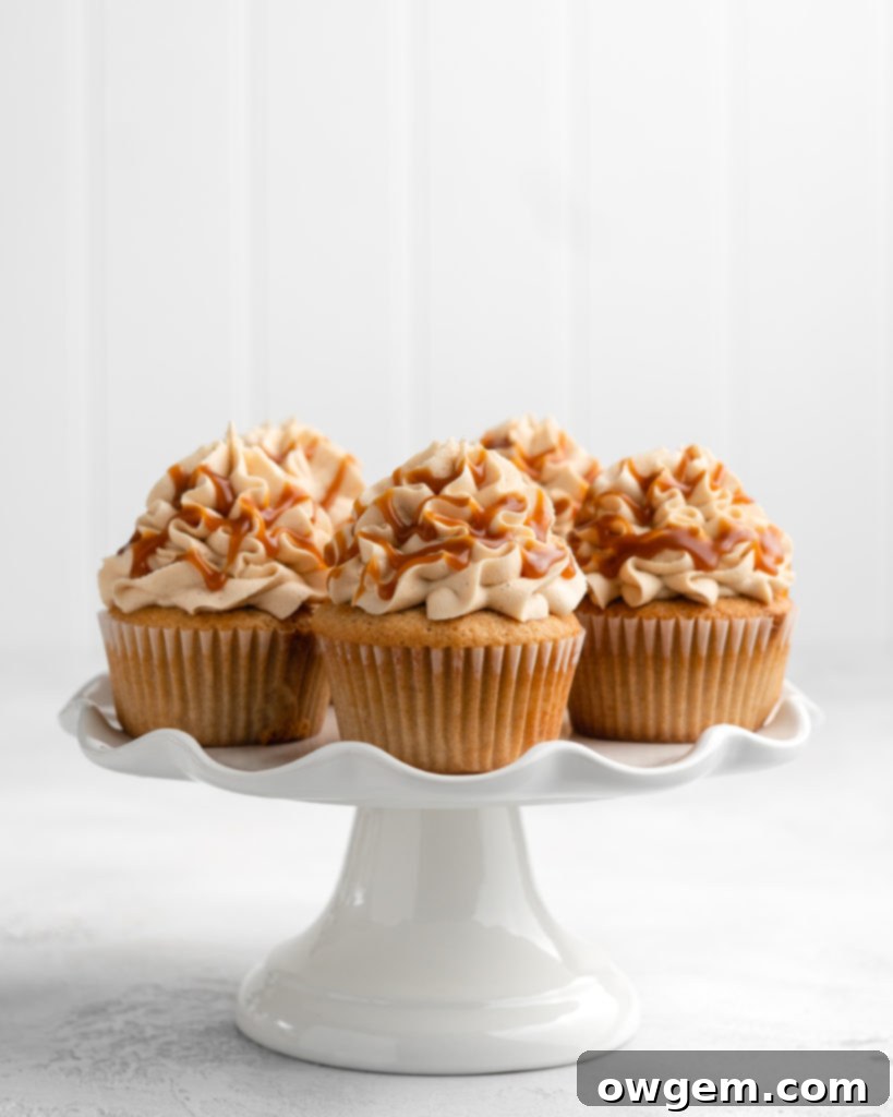 Earl Grey Cupcakes with Salted Caramel Buttercream displayed beautifully on a cake stand