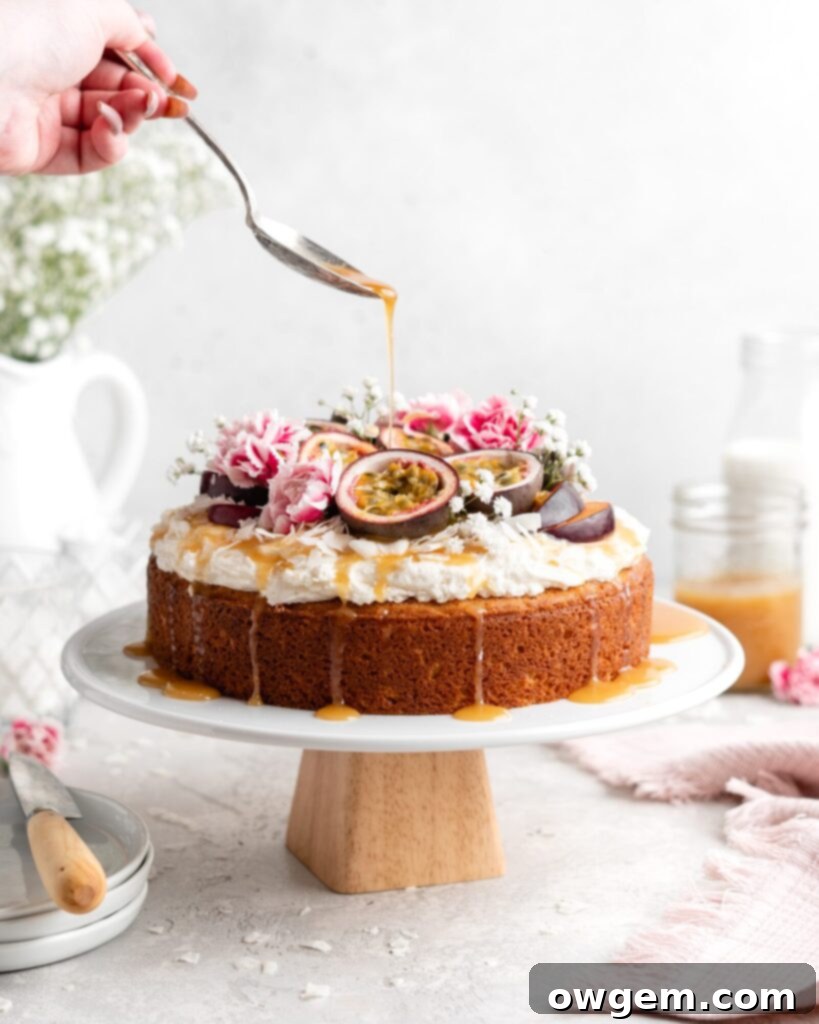 Moist, fluffy Triple Coconut Cake is topped with a creamy passion fruit caramel sauce