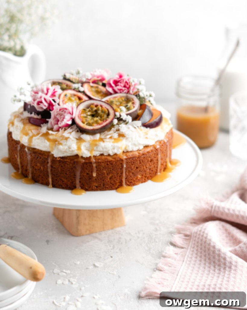 Moist, fluffy Triple Coconut Cake is topped with a creamy passion fruit caramel sauce