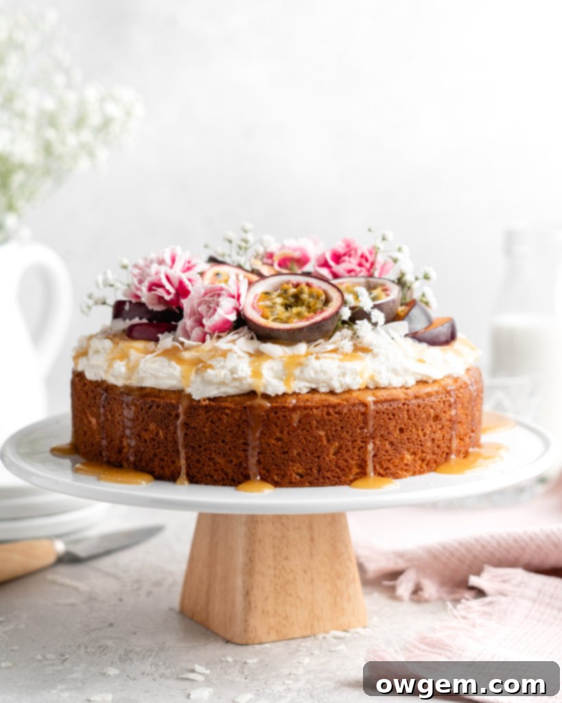 Moist, fluffy Triple Coconut Cake is topped with a creamy passion fruit caramel sauce