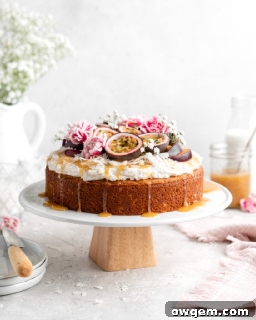 Moist, fluffy Triple Coconut Cake is topped with a creamy passion fruit caramel sauce