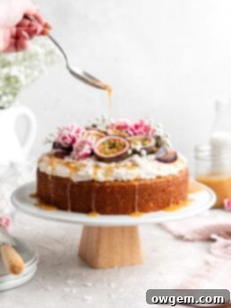 Moist, fluffy Triple Coconut Cake is topped with a creamy passion fruit caramel sauce