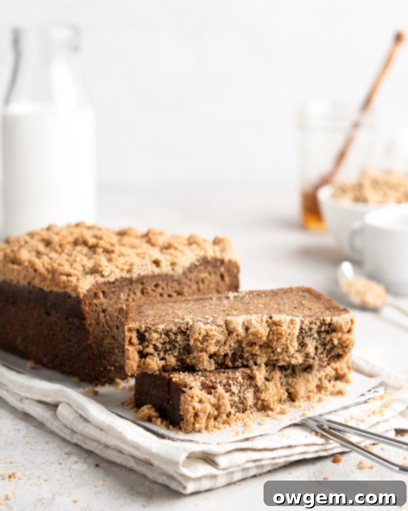 Close-up of the golden streusel topping on Chai Spiced Banana Bread, emphasizing its crisp and textured appearance.