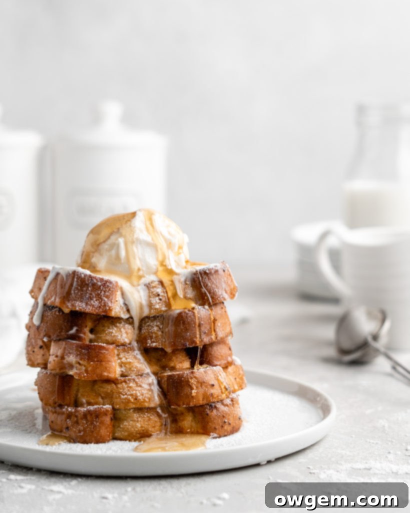 Buttermilk French Toast slices cooling on a wire rack after soaking in Grand Marnier custard